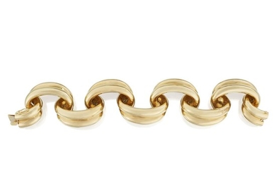 An eighteen karat gold bracelet designed as polished undulating...
