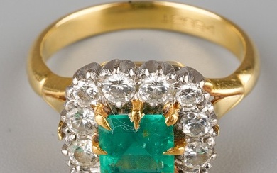 An emerald and diamond square cluster ring, set with a squar...