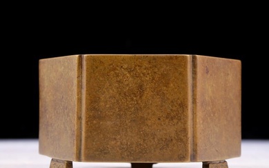 An exquisite bronze tripod censer