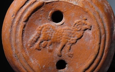 Ancient Roman Terracotta Oil lamp with a ram relief. c. 1st - 3rd Century AD. 12 cm L. Nice decoration.
