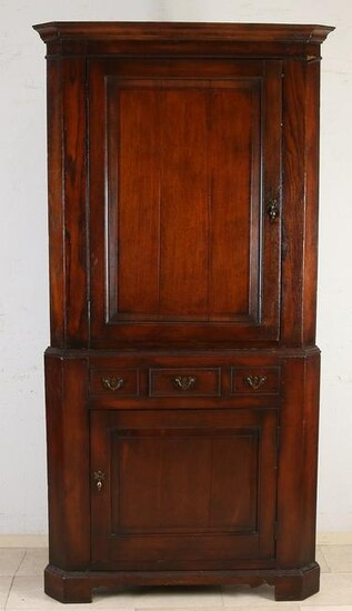 Antique English two-part oak corner cabinet with two