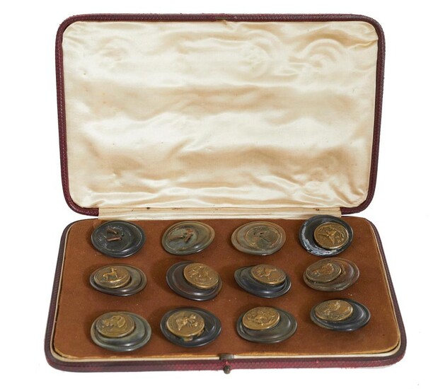 Antique cased set of sporting jacket buttons