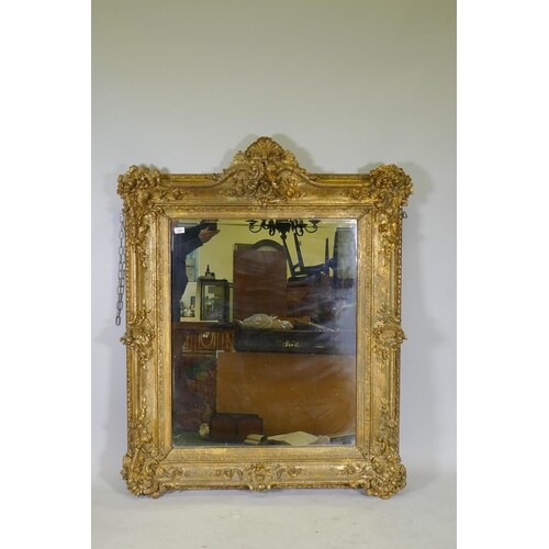 Antique giltwood and composition frame wall mirror, 46" x 57...