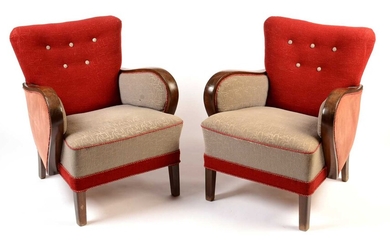 Arne Norell: a pair of mid 20th Century armchairs.