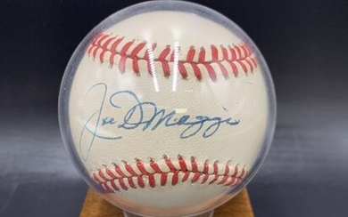 Autographed Baseball by Joe DiMaggio