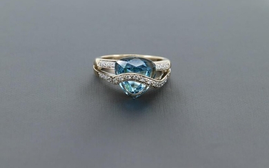 Blue center stone with Diamonds 14kt Yellow gold