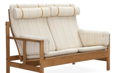 SOLD. Børge Mogensen: High-back two-seater sofa with oak frame. Loose cushions in seat, back and sides upholstered with light wool. – Bruun Rasmussen Auctioneers of Fine Art