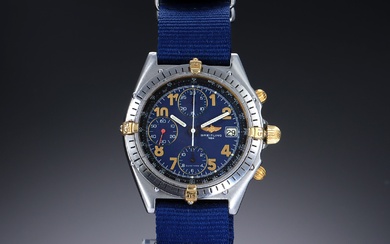 Breitling 'Chronomat'. Men's watch in 18 kt. gold and steel with blue dial, 1990s
