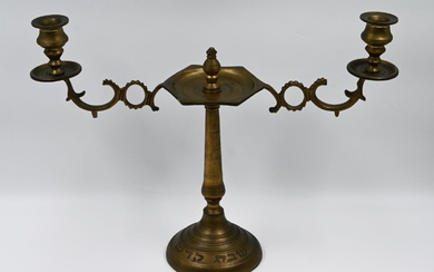 Bronze Shabbat candlestick. Bronze Shabbat candlestick, decorated with the...