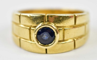 CARTIER; an 18ct yellow gold and sapphire single stone ring,...
