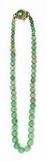 CELADON GREEN JADE BEADED CHOKER Graduated beads with a 14kt gold clasp set with a jade disc and pearl. Choker length 16".