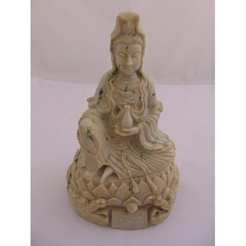 Chinese white jade carved figurine of Guanyin on customary l...