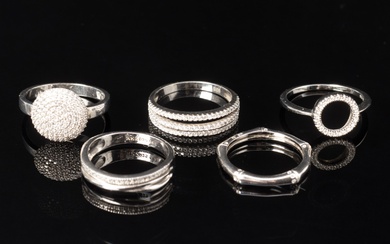 Collection rings of sterling silver, with cubic zirconia. (5)