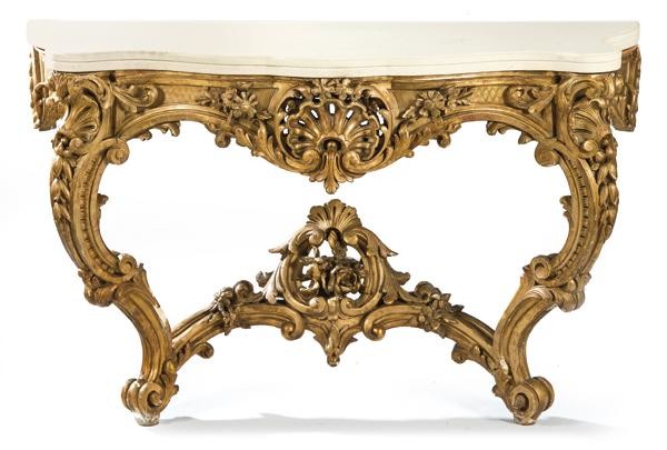 Console. Louis XV style, in carved and gilded wood with
