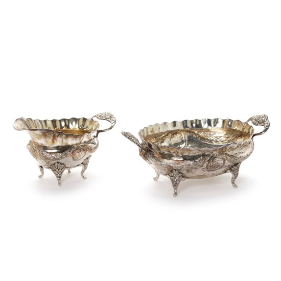 Danish silver Louis Seize oval sugar bowl and later creamer. 18th-19th century. Weight 595 gr. L. 17–23 cm. (2)
