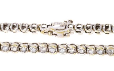 Diamond tennis bracelet with a line of round brilliant cut diamonds in 18ct white gold setting, estimated total diamond weight approximately 2.00cts.