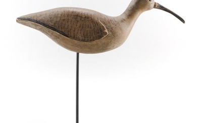 ESKIMO CURLEW DECOY With glass eyes and carved wings. Branded on underside "TWE". Length 18.5".