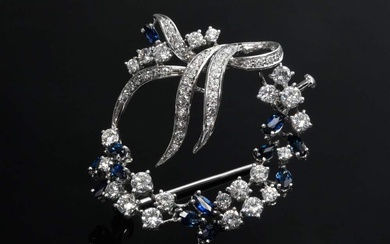 Fine white gold 750 loops wreath brooch with brilliant and octagonal diamonds (add. ca. 3ct/VSI/TW) and navette cut sapphires (add. ca. 1.60ct), 12g, Ø 4,3cm
