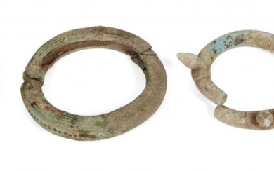 Five Chinese bronze bracelets, Neolithic period, one with chevron design,...