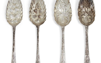 Four Georgian silver berry spoons, comprising a pair of George...