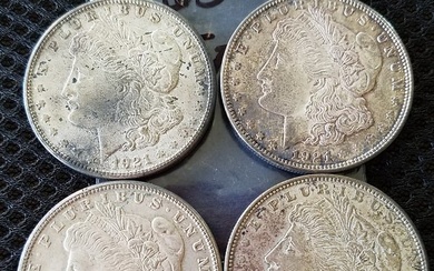 Four US Morgan Silver Dollars