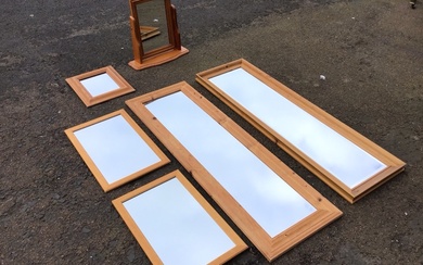 Four modern rectangular pine framed mirrors - a dressing table...