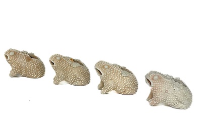 Four rare biscuit water droppers modelled as toads, Yongzheng period.