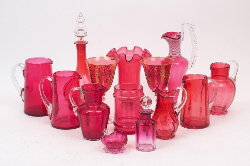 Fourteen pieces of Victorian and later cranberry glass, to include two goblets with gold detailing, 19cm high, a scalloped rim vase, 19cm high, a carafe with white caning, 27cm high, etc. (lot)