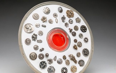 GROUP OF SILVER AND SILVER PLATE BUTTONS.