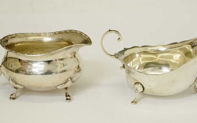 George V silver sauceboat and an Edward VII silver cream jug
