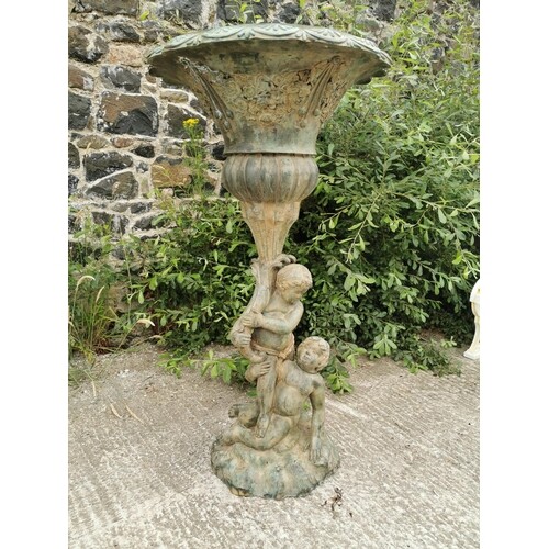 Good quality bronze fountain or planter decorated with putti...