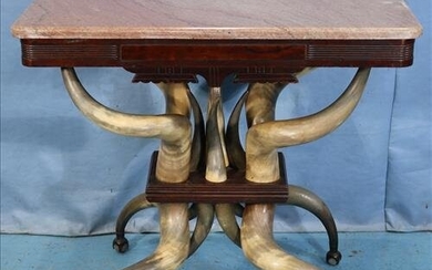 Horn table made from cow horns, 30 in. T, 32 in. W.