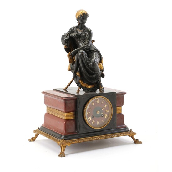 Jean Jules Salmson: A gilt and patinated bronze figure, the base inset with clockwork. Late 19th century. H. 47 cm. W. 33 cm. D. 24 cm. – Bruun Rasmussen Auctioneers of Fine Art