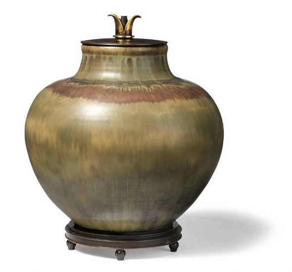 Knud Andersen, Royal Copenhagen: Stoneware lid jar decorated with green and brown glaze. Cover and base of patinated and partly gilded bronze. H. 27 cm.
