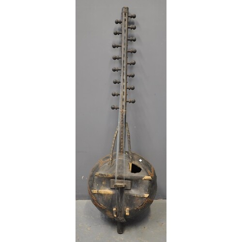 Large West African Kora multi-stringed instrument with metal...