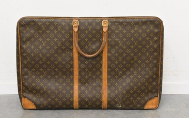 Louis Vuitton monogrammed canvas travel bag