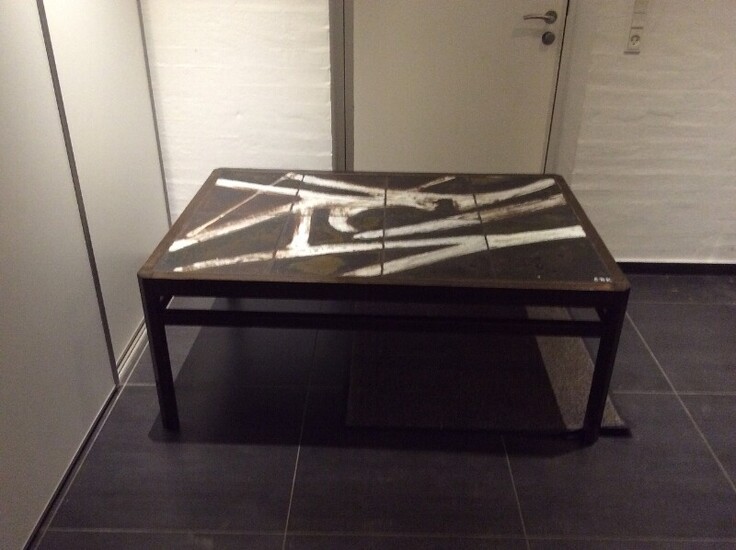 NOT SOLD. Ole Bjørn Krüger: A coffee table of stained oak. Table top inlaid with...