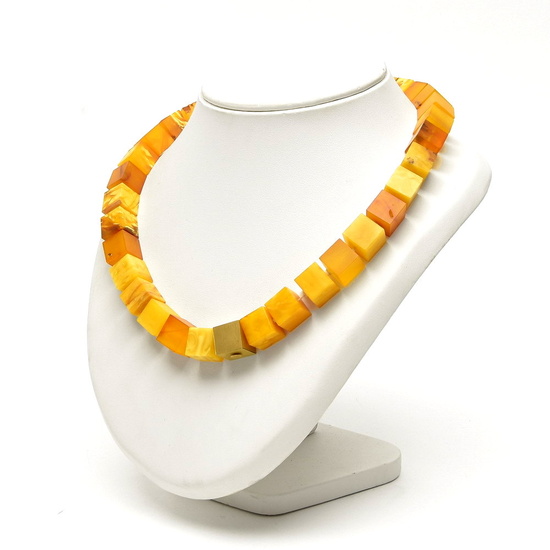 Necklace of square cut cubes of amber, with square golden...