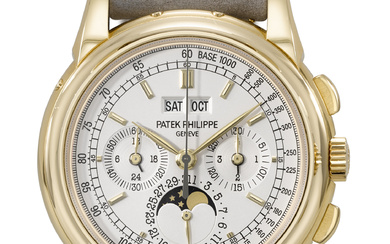 PATEK PHILIPPE. A VERY RARE AND COVETED 18K GOLD PERPETUAL...