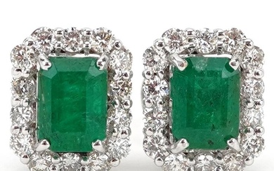 Pair of 18ct white gold emerald and diamond cluster stud ear...