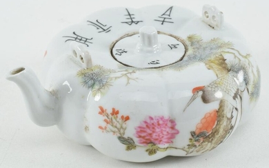 Porcelain teapot. China. Early 20th century. Melon