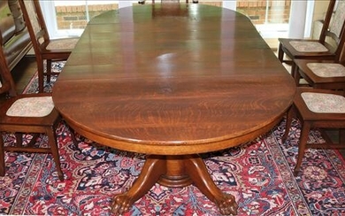 Quarter sawn oak dining table with carved base
