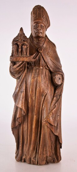 [RELIGIOSA] Saint Augustin en chêne sculpté. Debout, coiffé d'une mitre,...