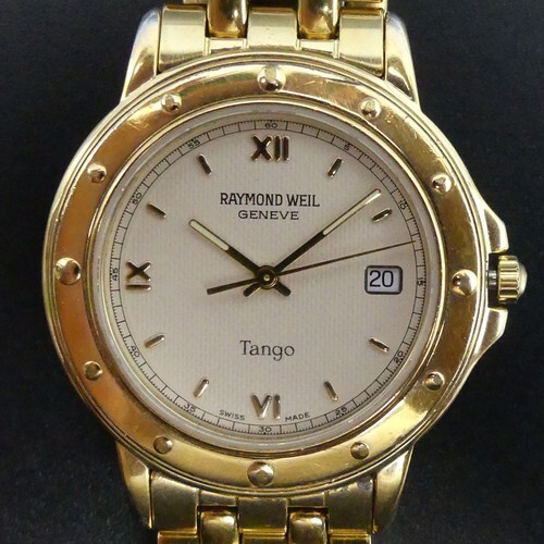 Raymond Weil gold tone Tango date adjust quartz watch. 35 mm...
