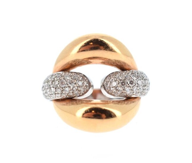 Ring in 18 K (750°/°°) yellow and white gold partially paved with brilliant-cut diamonds.