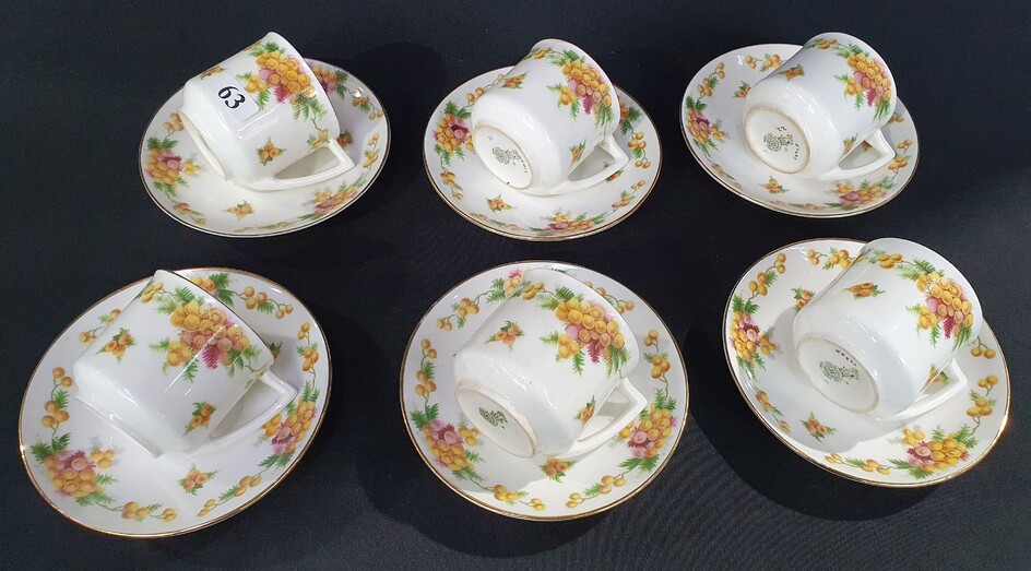SIX ROYAL DOULTON DEMITASSE CUPS AND SAUCERS