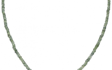 Single strand necklace with natural green sapphire and a 14K. yellow gold closure.