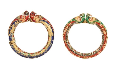 TWO GILT AND POLYCHROME-ENAMELLED BANGLES WITH PARROT HEADS Jaipur, Rajasthan, North-Western India, 20th century