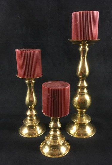 Three Brass Candlesticks and Candles