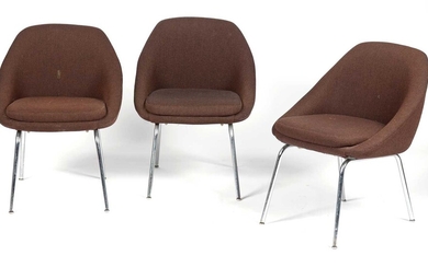 Three mid Century brown upholstered and chrome office chairs.